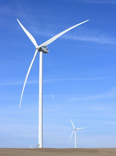 Oklahoma Windfarm against a bright, blue sky